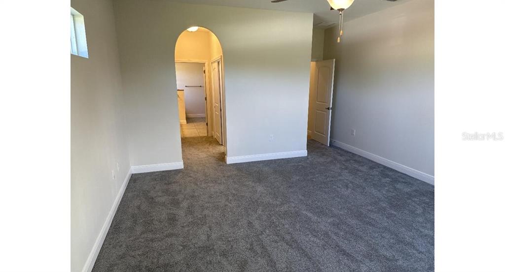 2573 Tulsa Avenue North Port, FL 34286 - Photo 6 of 11 a view of a room with wooden floor and window
