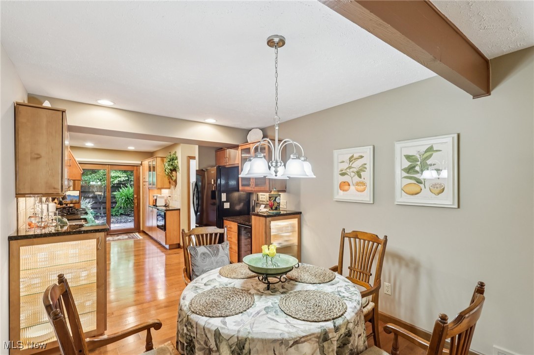 235 Solon Road, Unit D Chagrin Falls, OH 44022 - Photo 7 of 37 Dining area with recessed lighting and beverage cooler