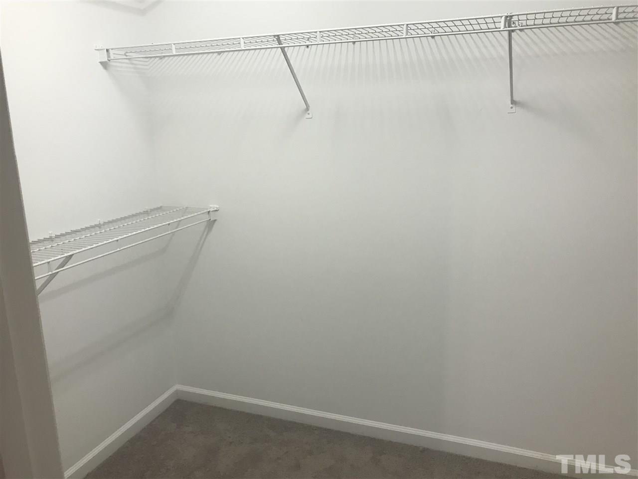 1534 Middle Ridge Drive Willow Spring, NC 27592 - Photo 15 of 23 Great walk-in closet in master.