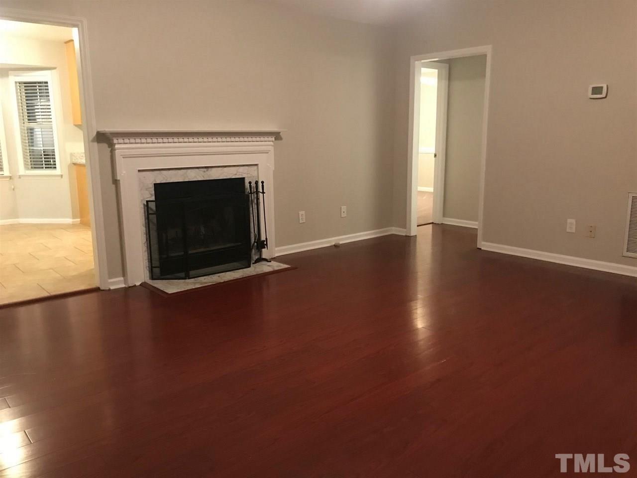1534 Middle Ridge Drive Willow Spring, NC 27592 - Photo 20 of 23 Another view of living room with gleaming floors!