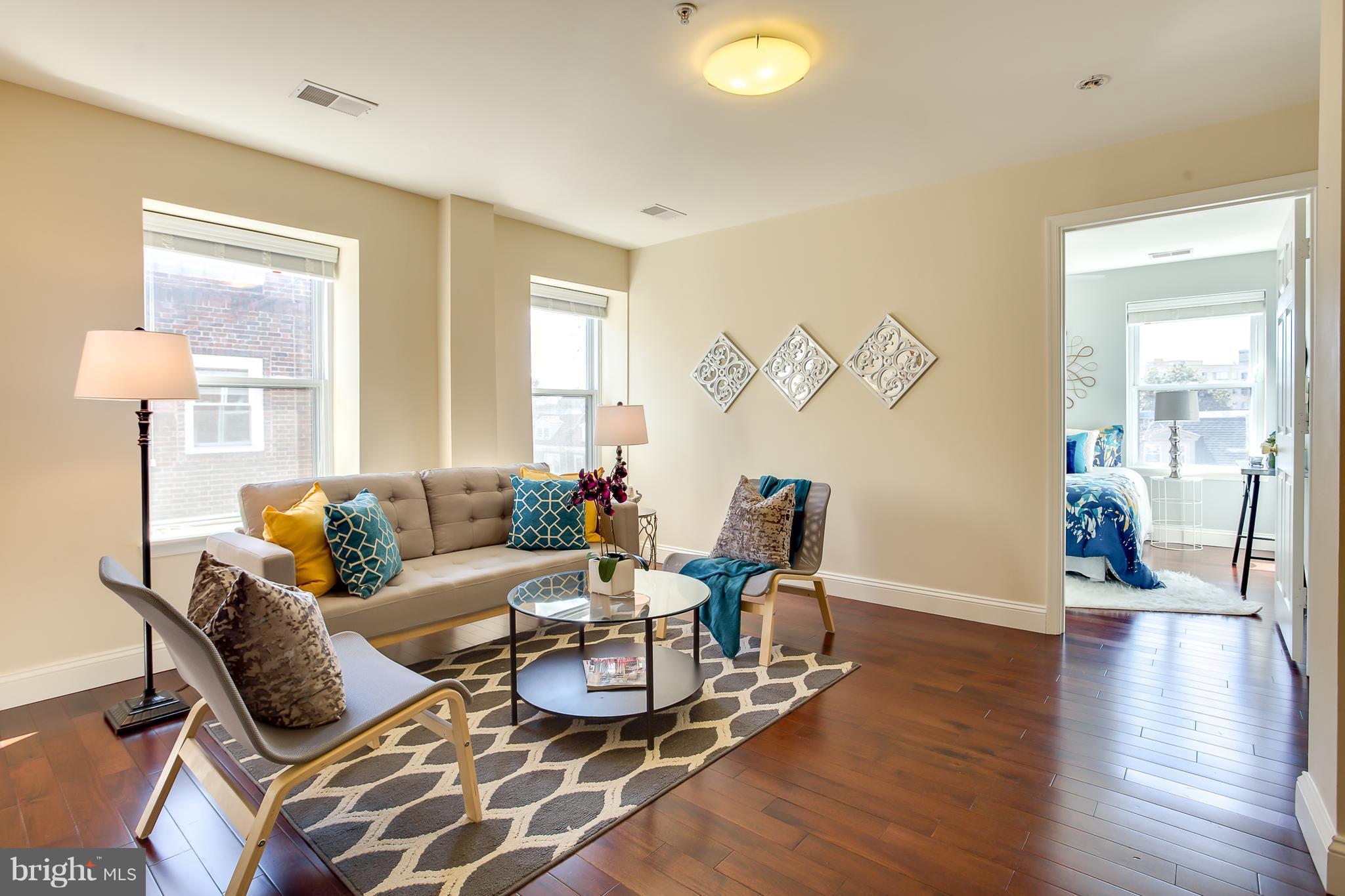 1441 Spring Road Northwest, Unit 301 Washington, DC 20010 - Photo 6 of 27 Gorgeous Living Room with Ample Space