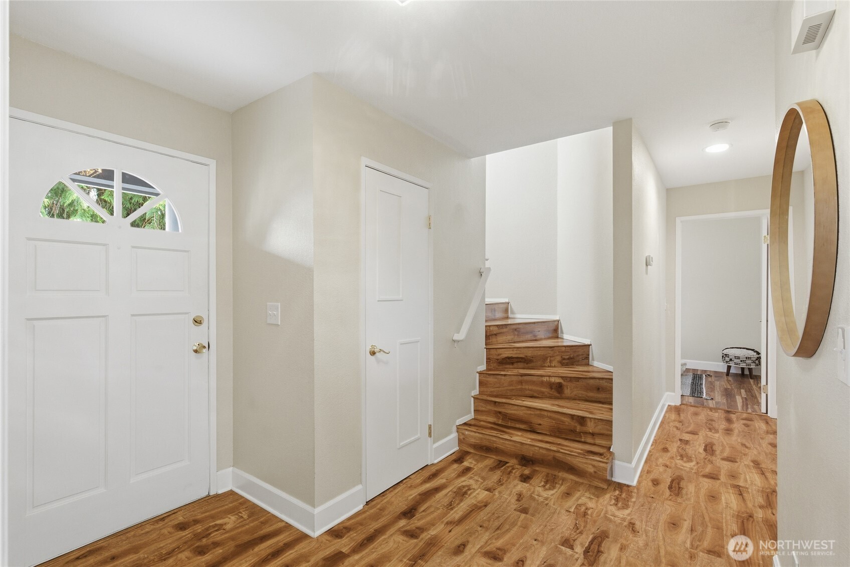 412 164th Place Southeast Bothell, WA 98012 - Photo 11 of 39 a view of entryway with wooden floor
