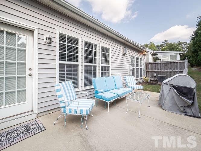5323 Brandy Bay Road Raleigh, NC 27613 - Photo 22 of 29 a building outdoor space with patio furniture