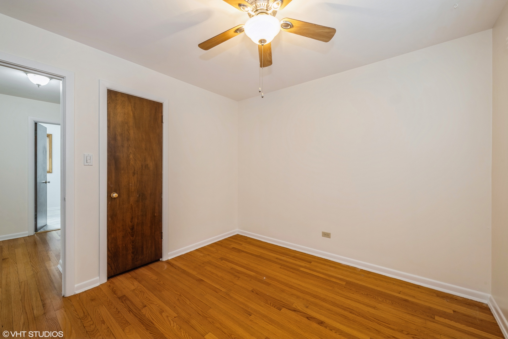 2027 Dundee Road Northbrook, IL 60062 - Photo 7 of 9 a view of empty room with wooden floor