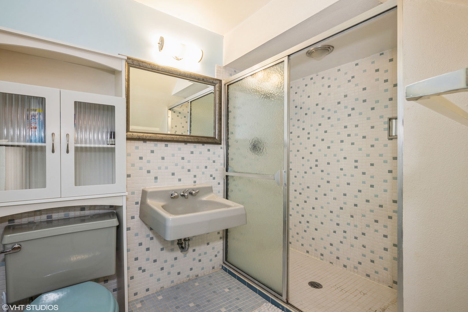 2027 Dundee Road Northbrook, IL 60062 - Photo 9 of 9 a bathroom with a sink toilet and shower