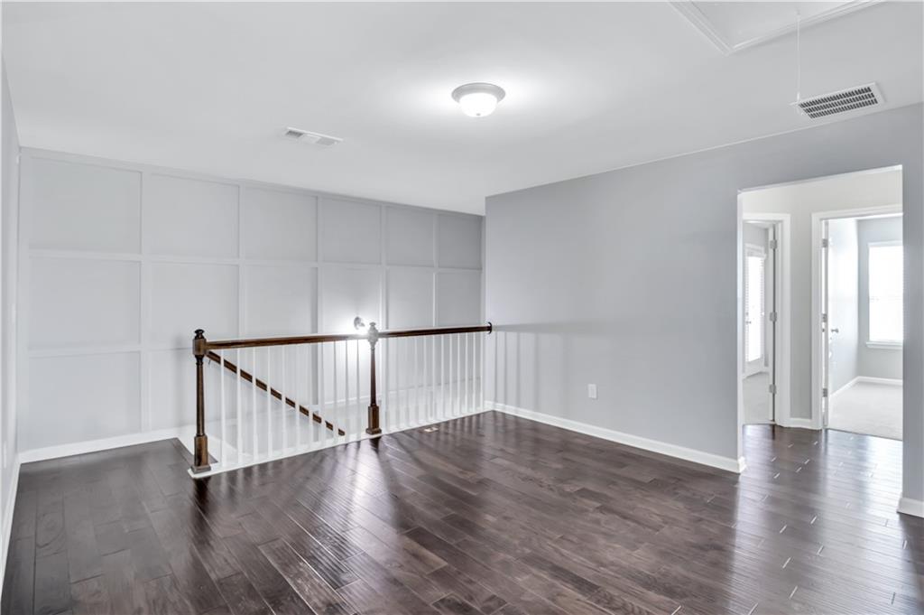 330 Avalon Square Fairburn, GA 30213 - Photo 20 of 52 a view of entryway with wooden floor