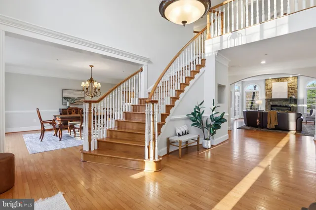 a view of a livingroom with furniture and a floor to ceiling window