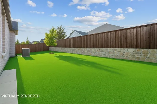 a view of a backyard with a garden