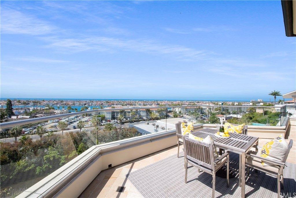 a view of a balcony with city view