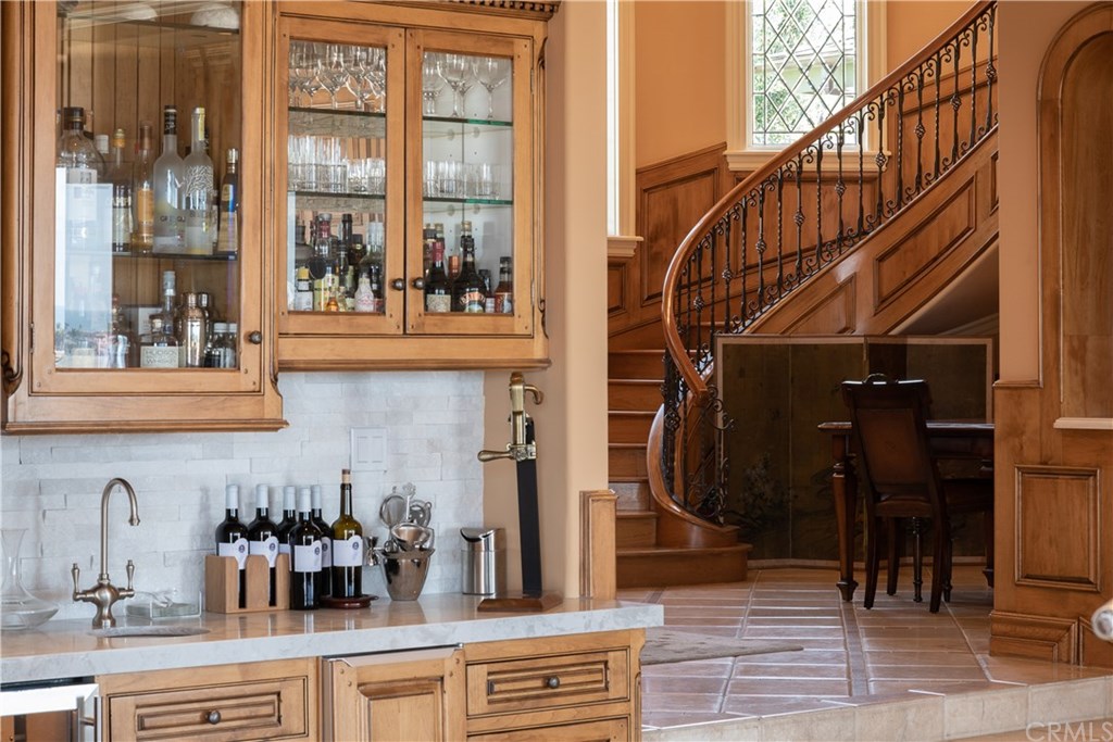 911 Kings Road Newport Beach, CA 92663 - Photo 14 of 47 a kitchen with a sink and a window