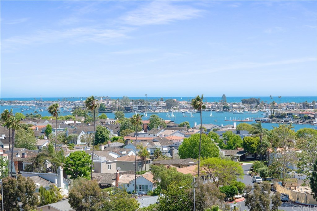 911 Kings Road Newport Beach, CA 92663 - Photo 2 of 47 an aerial view of a city with lots of residential buildings