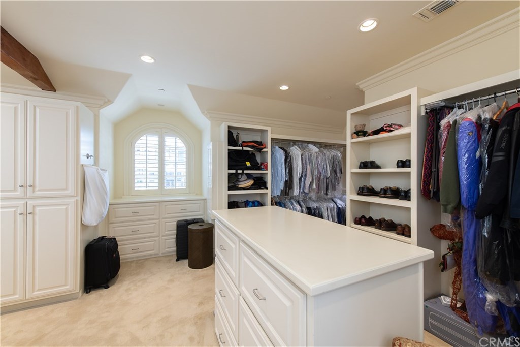 911 Kings Road Newport Beach, CA 92663 - Photo 27 of 47 a kitchen with a refrigerator and a sink