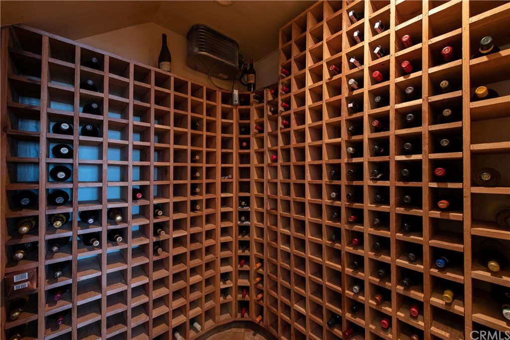 911 Kings Road Newport Beach, CA 92663 - Photo 34 of 47 a bathroom with a black and white checkered checkered floor