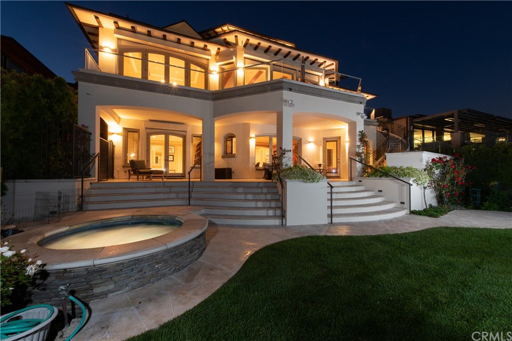 911 Kings Road Newport Beach, CA 92663 - Photo 4 of 47 a view of a house with a sink and a backyard