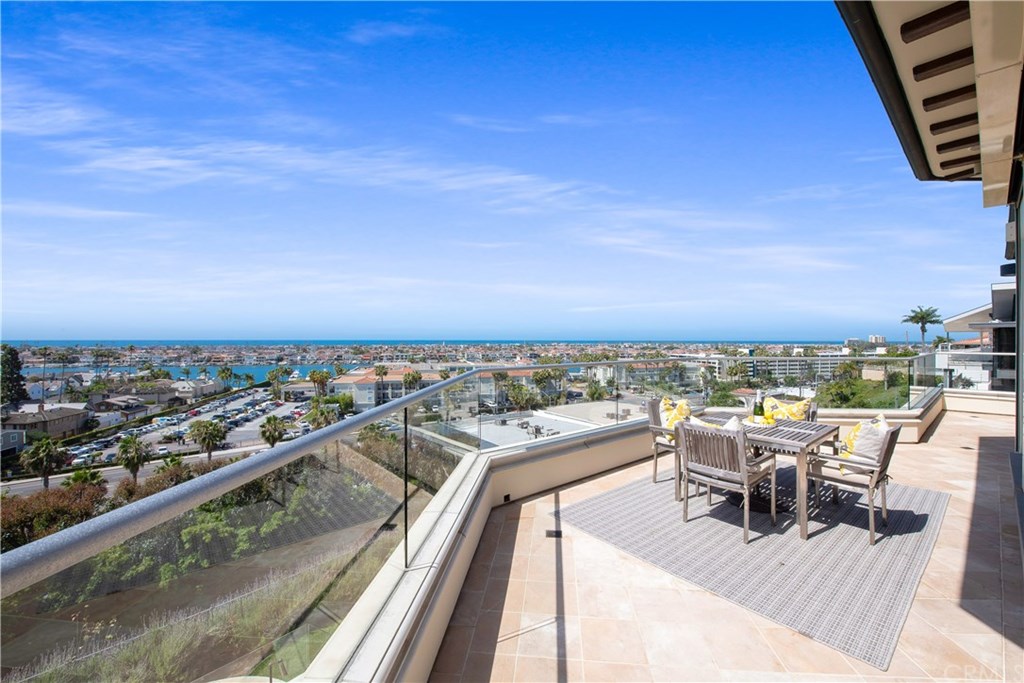 911 Kings Road Newport Beach, CA 92663 - Photo 10 of 47 a view of a balcony with an ocean view