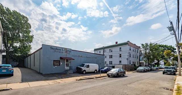 a view of car parked in front of house