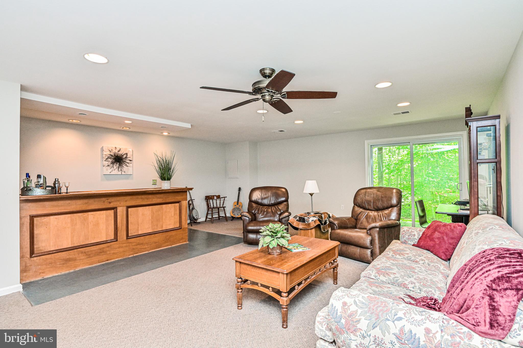 11730 Quay Road Oakton, VA 22124 - Photo 38 of 58 LOWER LEVEL REC ROOM W/ SGD TO LOVELY BACKYARD