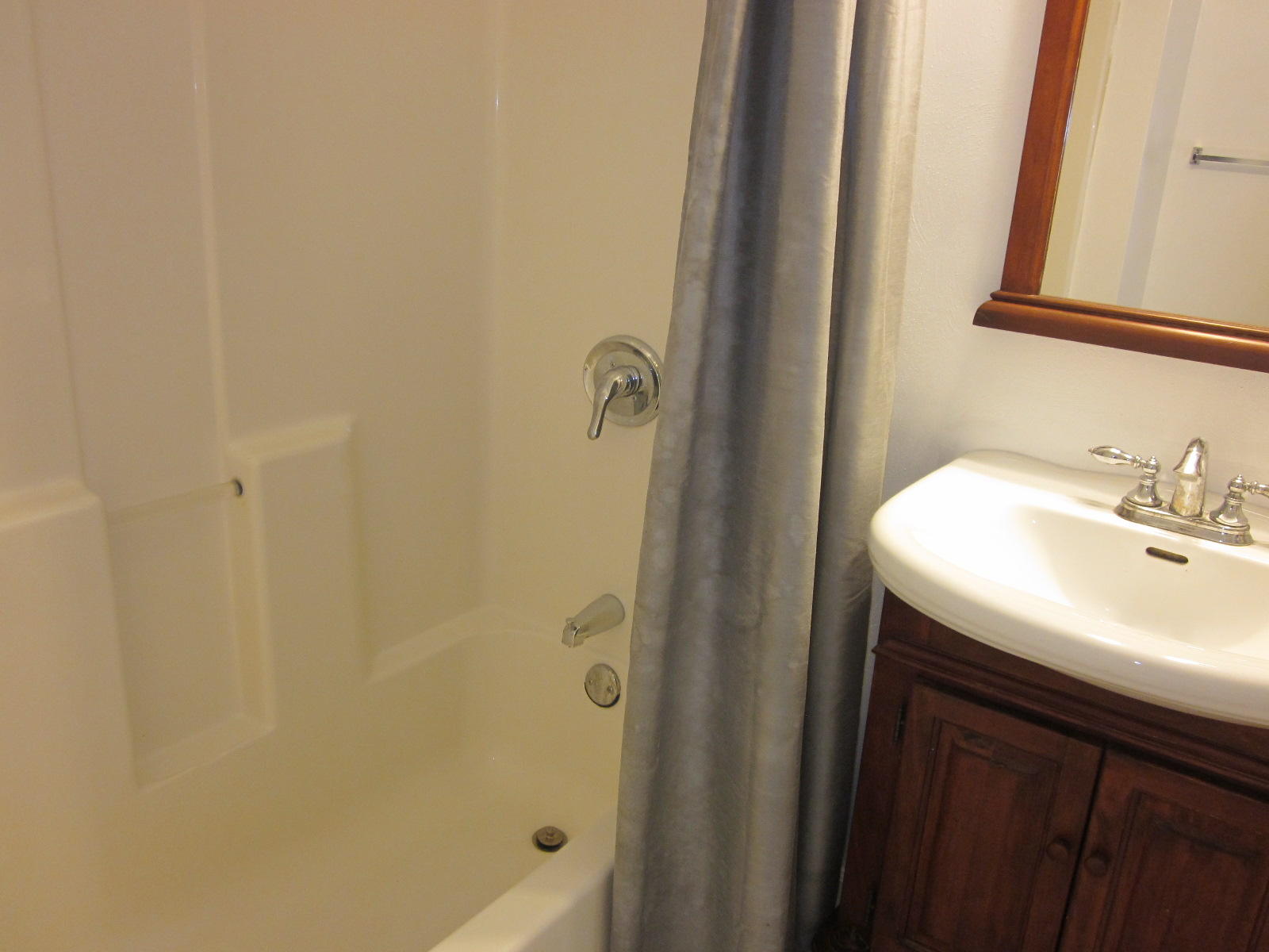 1885 Old Forge Road Callaway, VA 24067 - Photo 23 of 48 a bathroom with a sink a mirror and shower