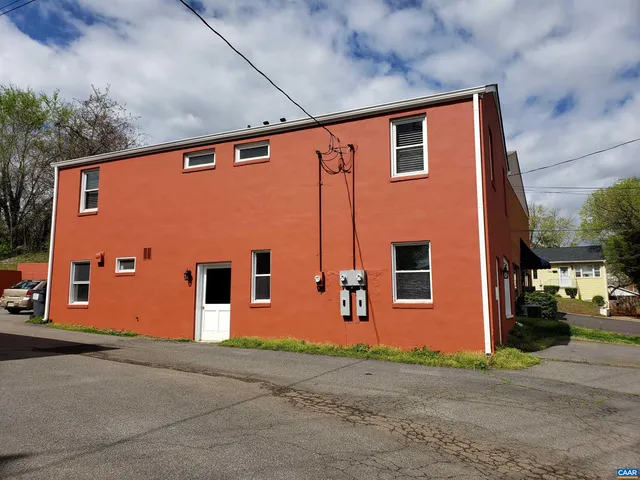 a front view of a house with garage