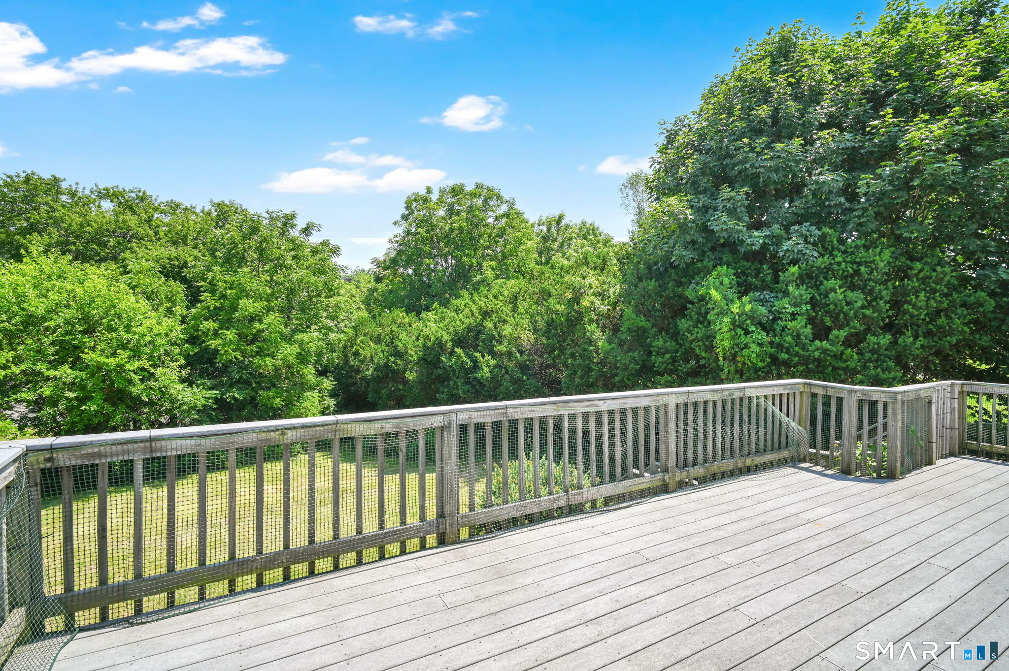 7 Rogers Drive Meriden, CT 06450 - Photo 5 of 40 a view of deck with wooden floor and fence