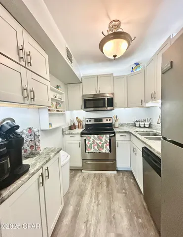 $334,500 | 5717 Thomas Drive, Unit C126, Panama City, FL 32408