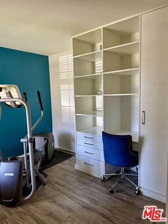 a room with furniture and a wooden floor