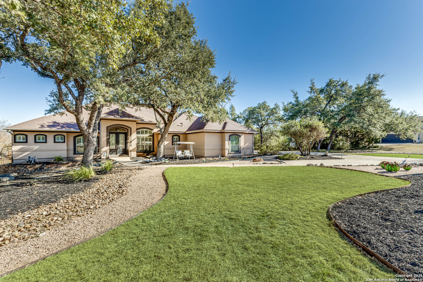 160 Gadwall Way Spring Branch, TX 78070 - Photo 1 of 45 a front view of a house with garden