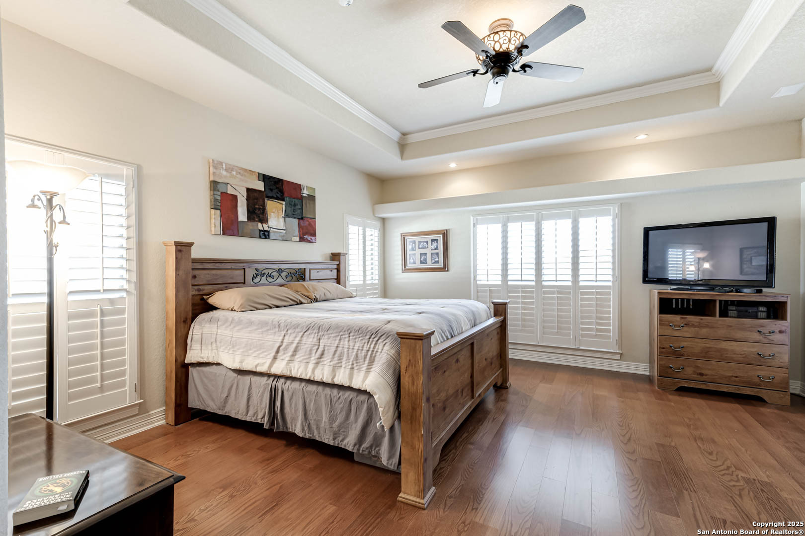 160 Gadwall Way Spring Branch, TX 78070 - Photo 12 of 45 a spacious bedroom with a bed and a flat screen tv