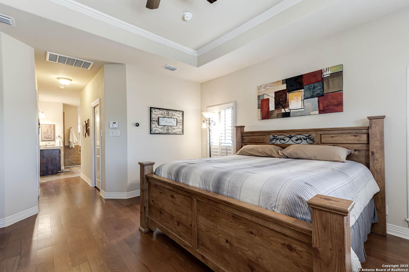 160 Gadwall Way Spring Branch, TX 78070 - Photo 13 of 45 a bedroom with a bed and wooden floor