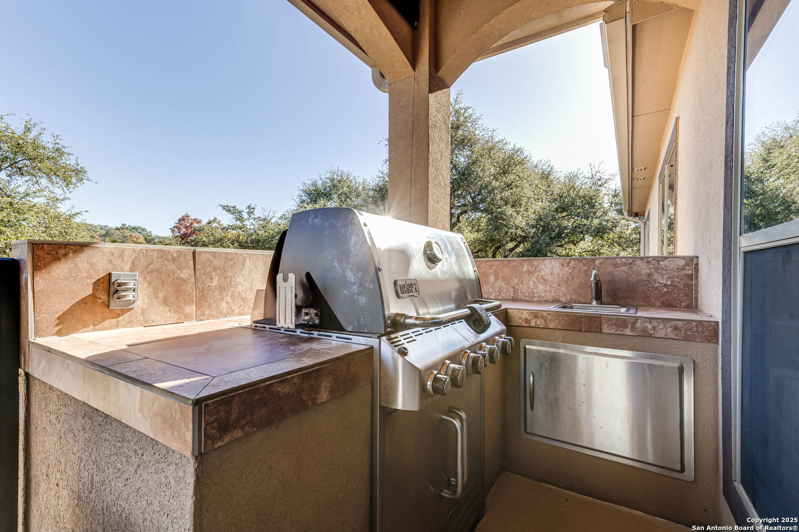 160 Gadwall Way Spring Branch, TX 78070 - Photo 26 of 45 a view of barbeque and kitchen