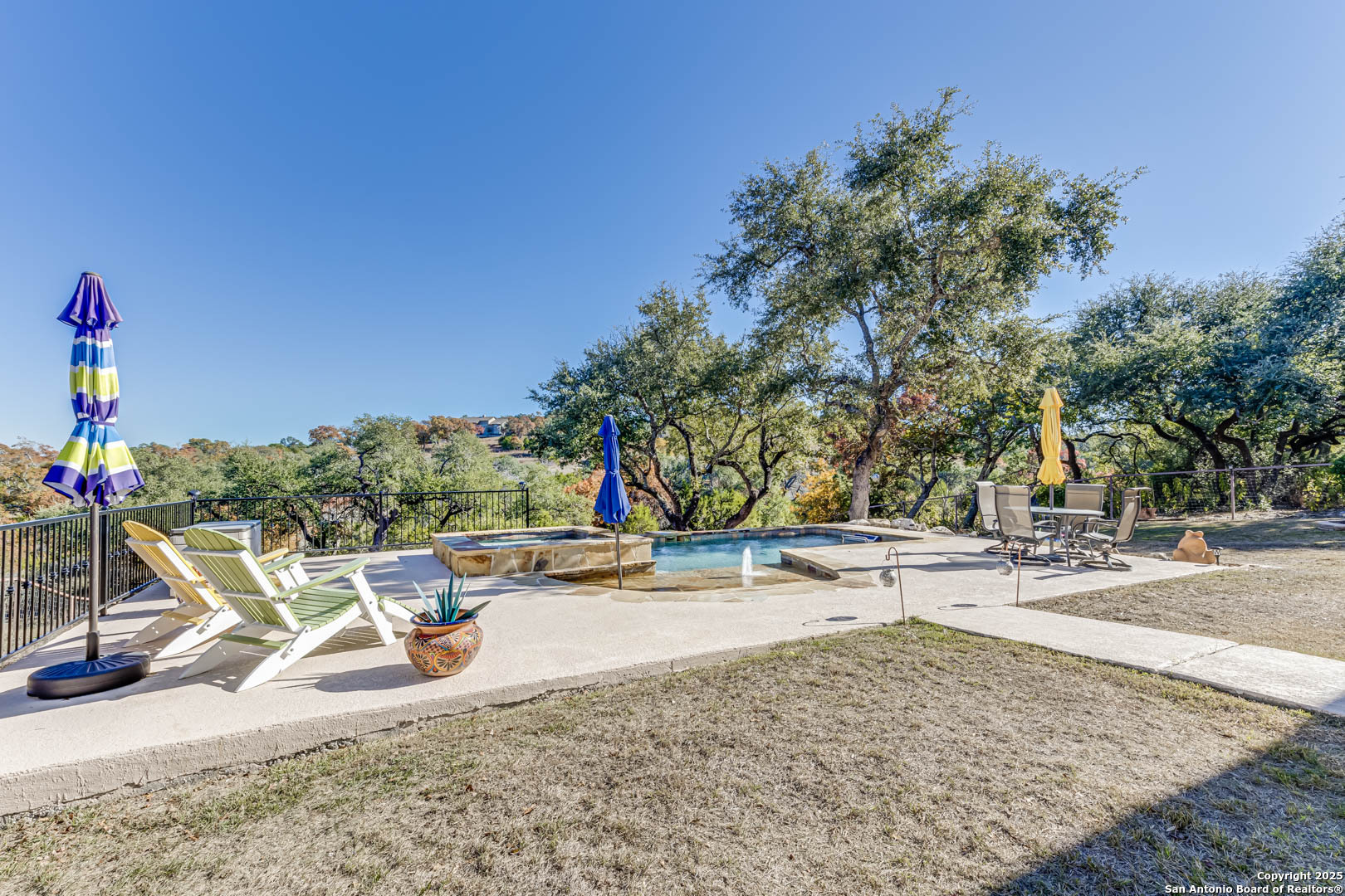 160 Gadwall Way Spring Branch, TX 78070 - Photo 29 of 45 a view of a park with swings and slides