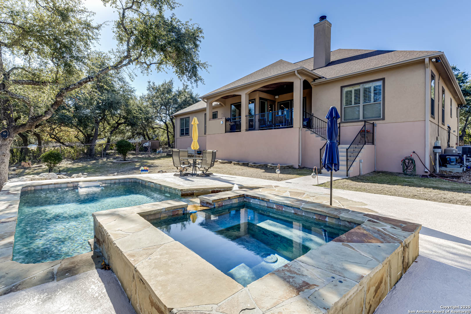 160 Gadwall Way Spring Branch, TX 78070 - Photo 30 of 45 a view of a house with backyard and sitting area