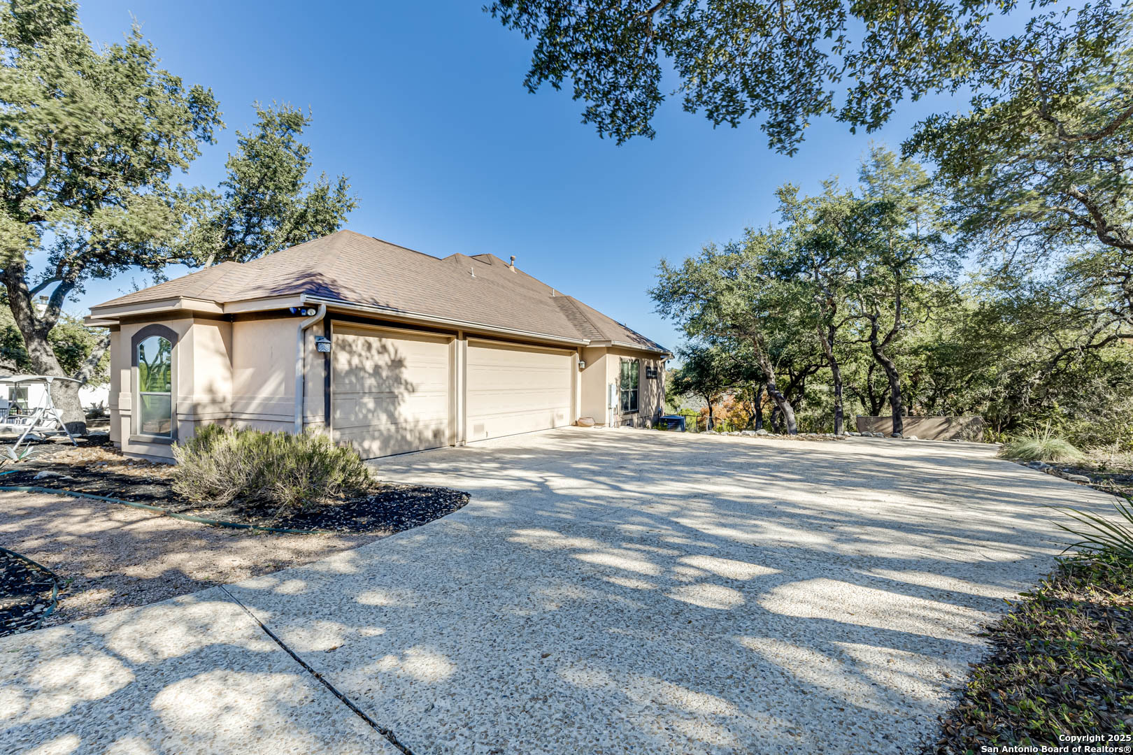 160 Gadwall Way Spring Branch, TX 78070 - Photo 44 of 45 a front view of a house with a garden