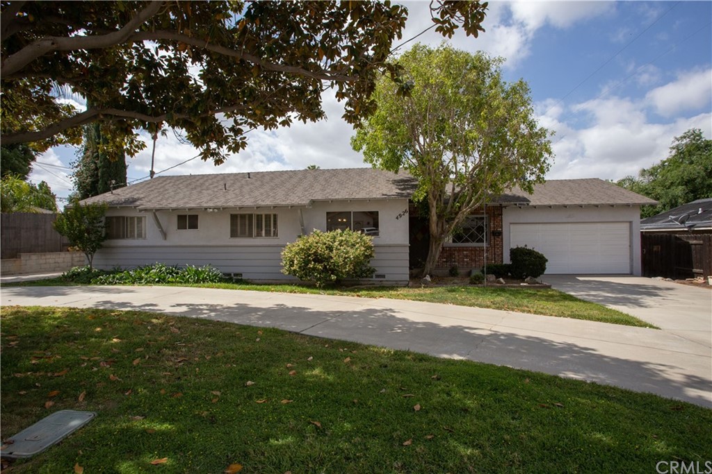 4926 Rubidoux Avenue Riverside, CA 92504 - Photo 1 of 1 a front view of a house with a yard and garage