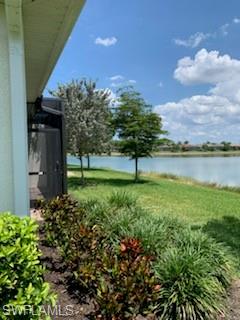 14631 Edgewater Circle Naples, FL 34114 - Photo 3 of 16 a view of a garden with a building