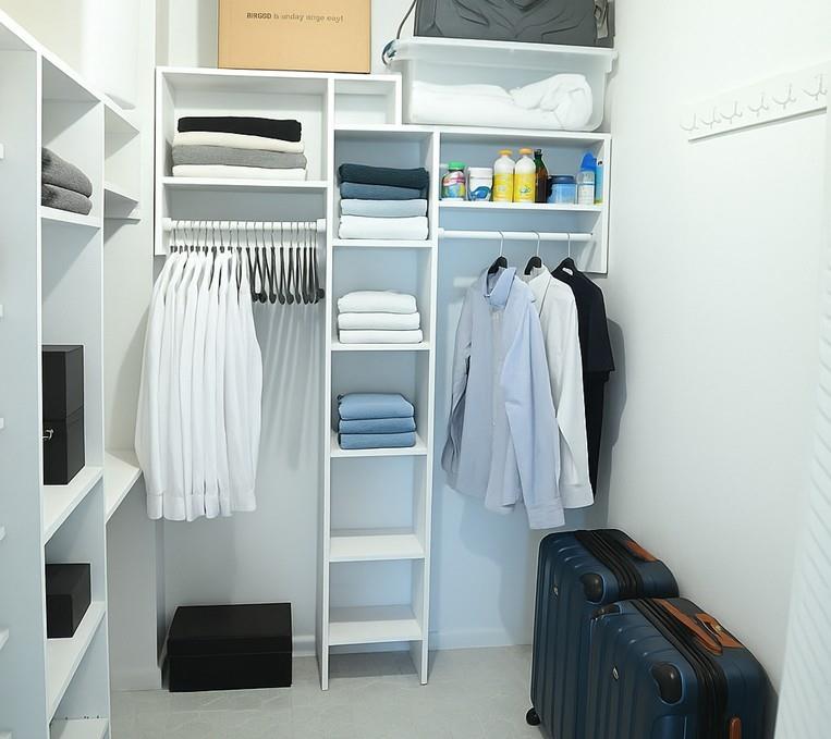 531 North Ocean Boulevard, Unit 1911 Pompano Beach, FL 33062 - Photo 17 of 34 a view of walk in closet with clothes and shoes