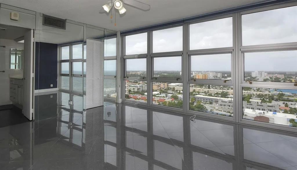 531 North Ocean Boulevard, Unit 1911 Pompano Beach, FL 33062 - Photo 19 of 34 a view of an empty room with a window