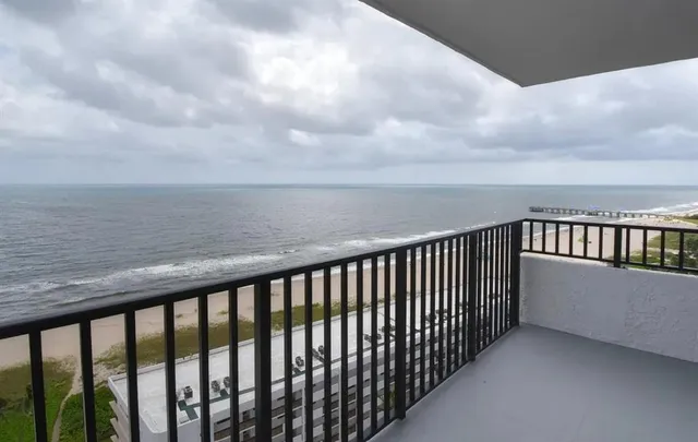a balcony with an outdoor space