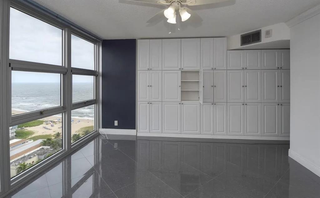 531 North Ocean Boulevard, Unit 1911 Pompano Beach, FL 33062 - Photo 21 of 34 a view of an empty room with a window