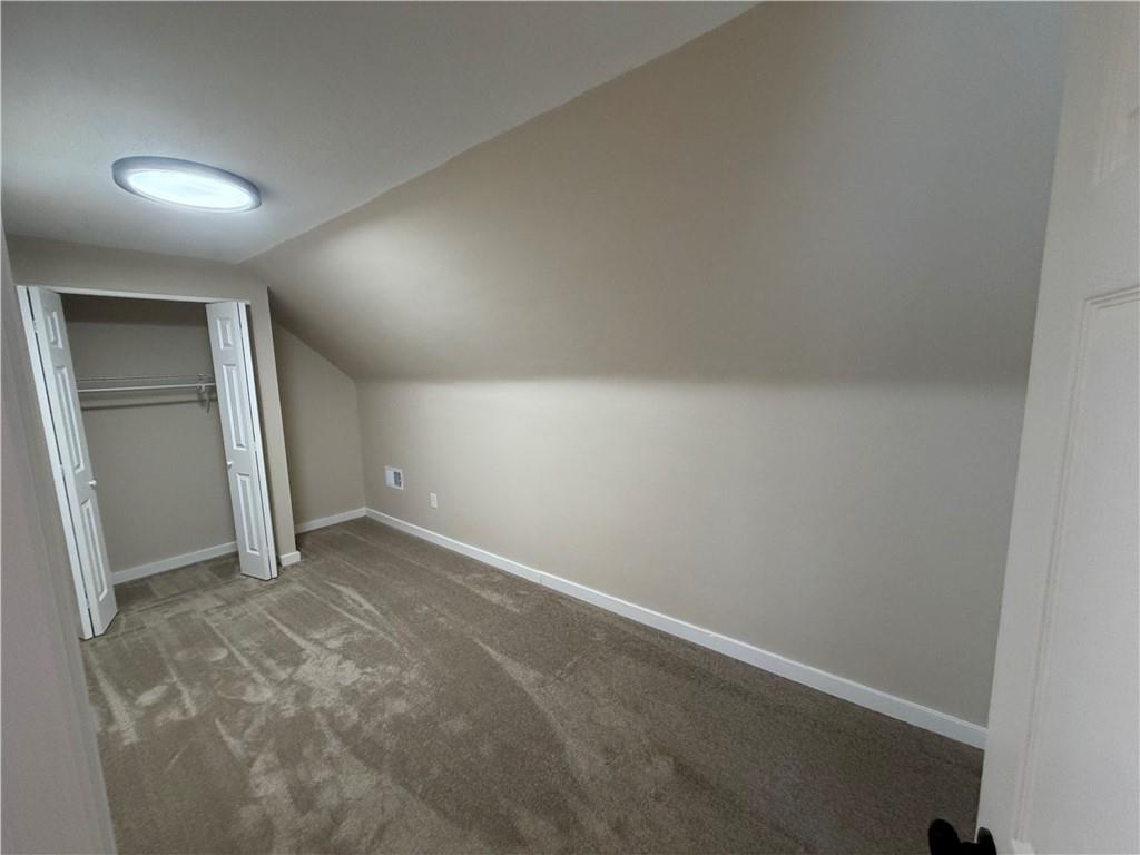 315 Caperton Street Pittsburgh, PA 15210 - Photo 8 of 16 an empty room with a workbench