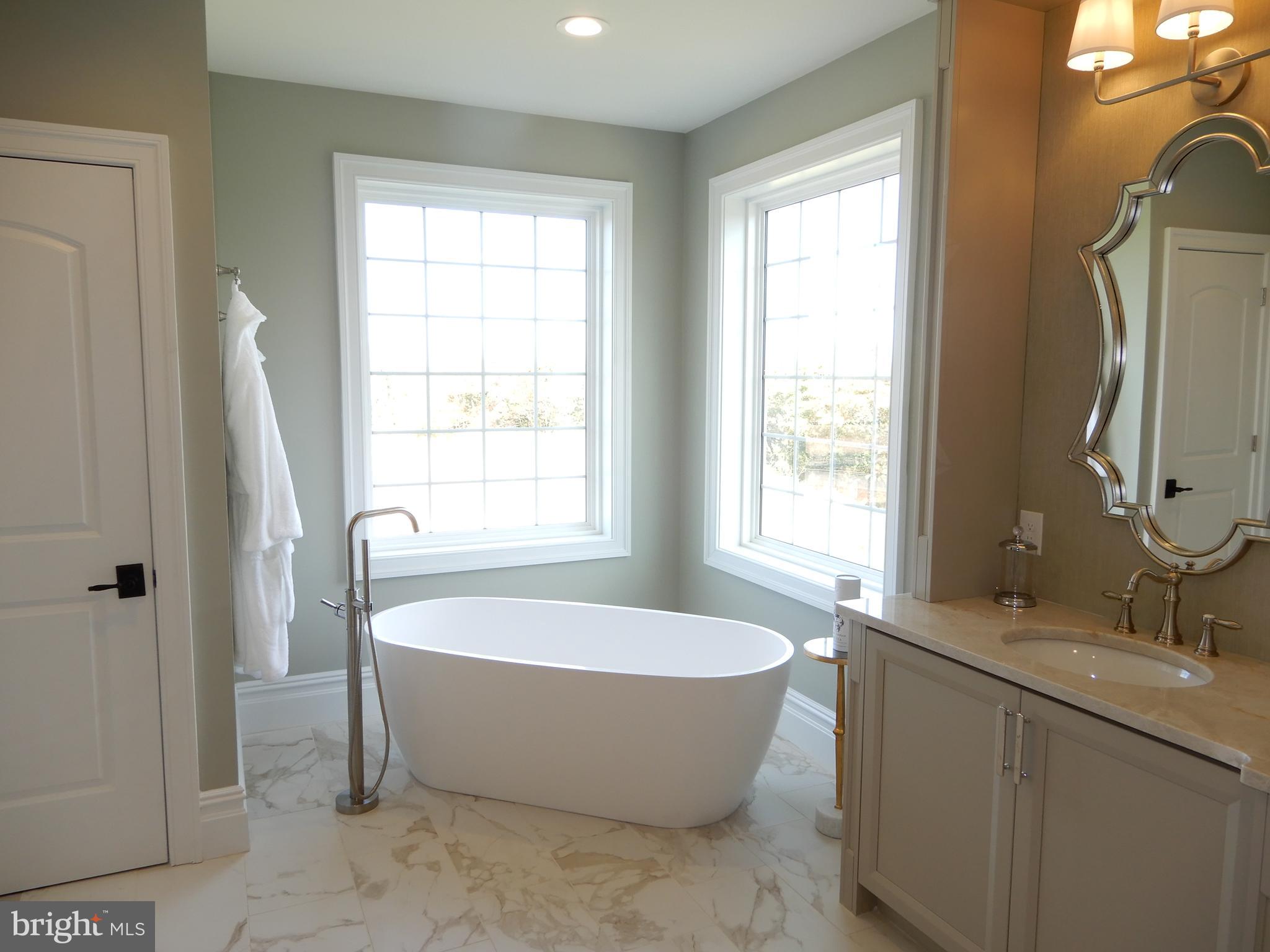152 Watercrest Drive Doylestown, PA 18901 - Photo 45 of 64 a bathroom with a bathtub and sink