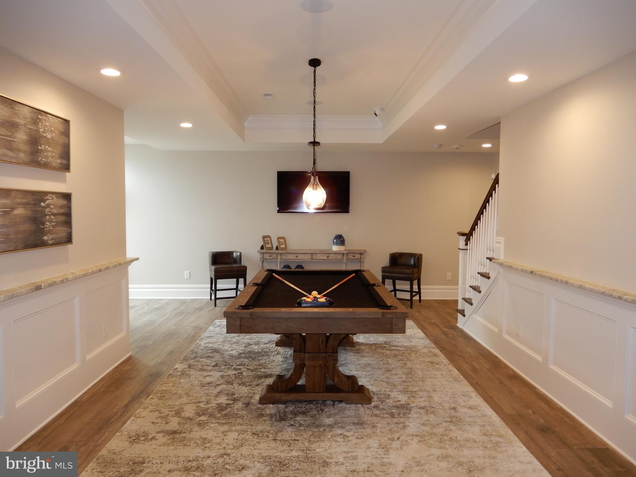 152 Watercrest Drive Doylestown, PA 18901 - Photo 56 of 64 a living room with furniture a flat screen tv and a fireplace