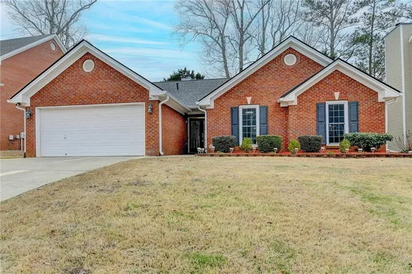 a front view of house with yard