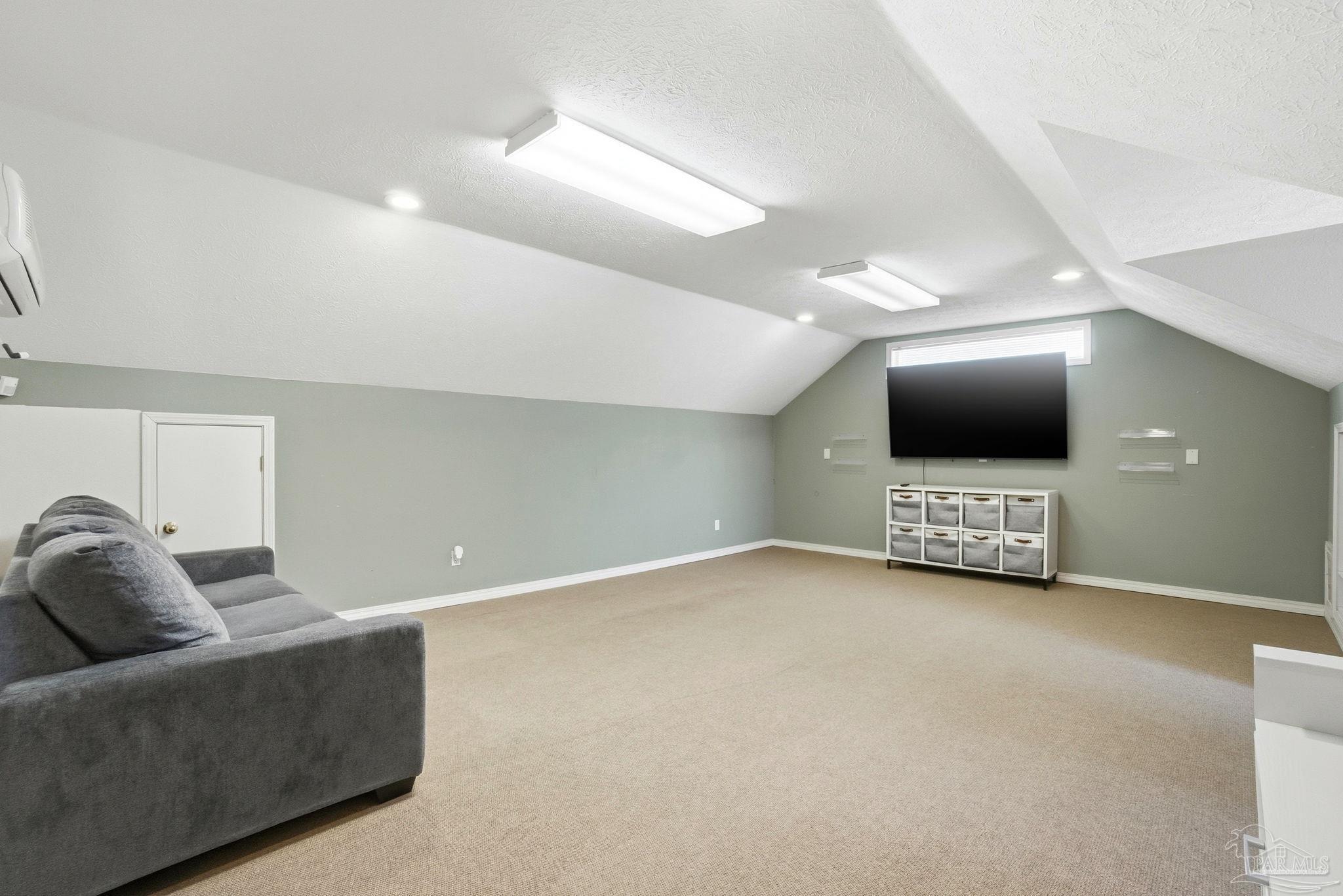 1805 West 10 Mile Road Pensacola, FL 32534 - Photo 27 of 61 a living room with furniture and a flat screen tv