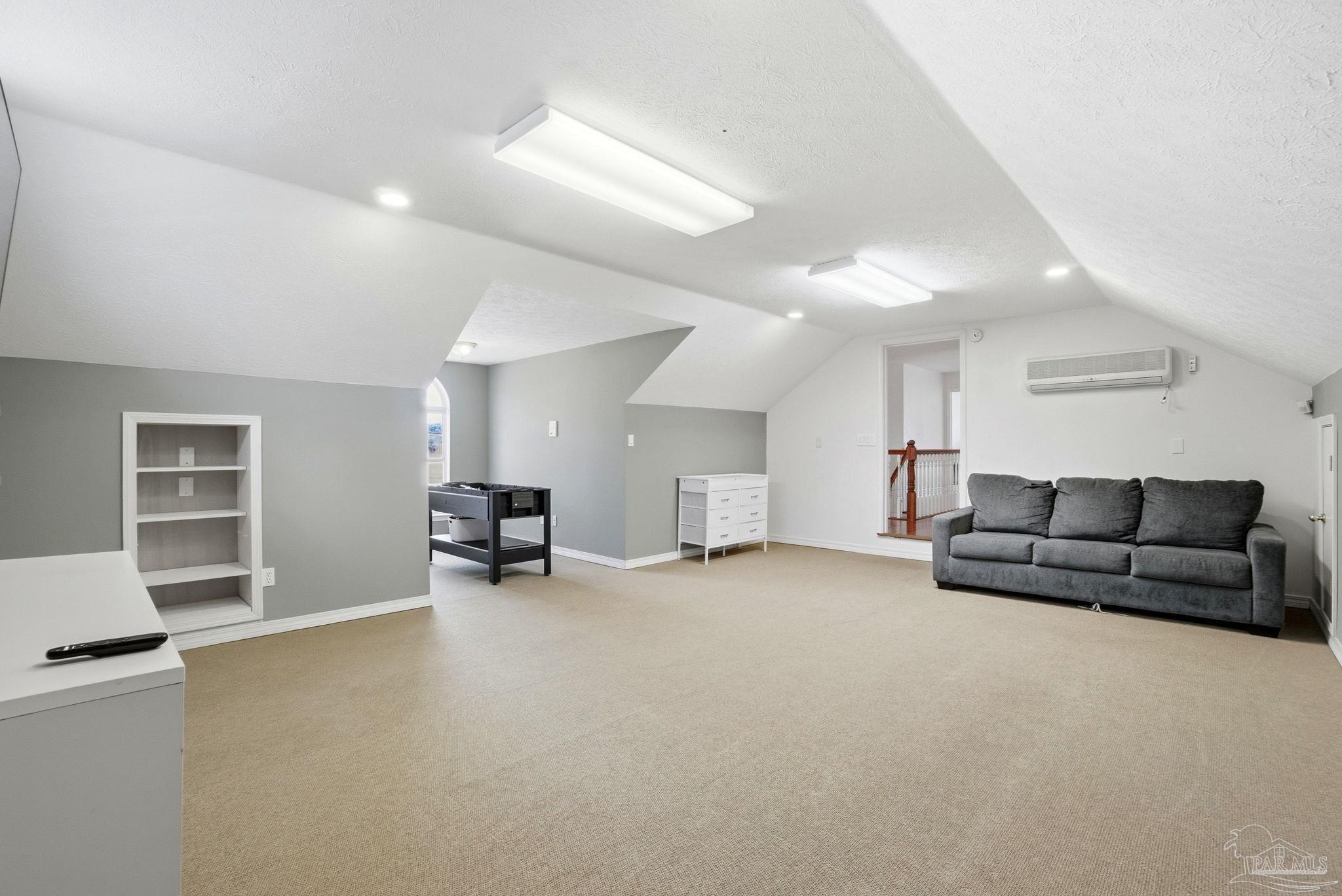 1805 West 10 Mile Road Pensacola, FL 32534 - Photo 28 of 61 a living room with furniture and a flat screen tv