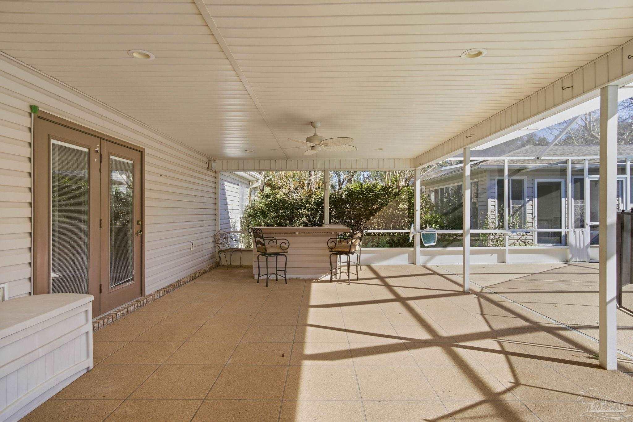 1805 West 10 Mile Road Pensacola, FL 32534 - Photo 33 of 61 a building outdoor space with patio furniture and potted plants