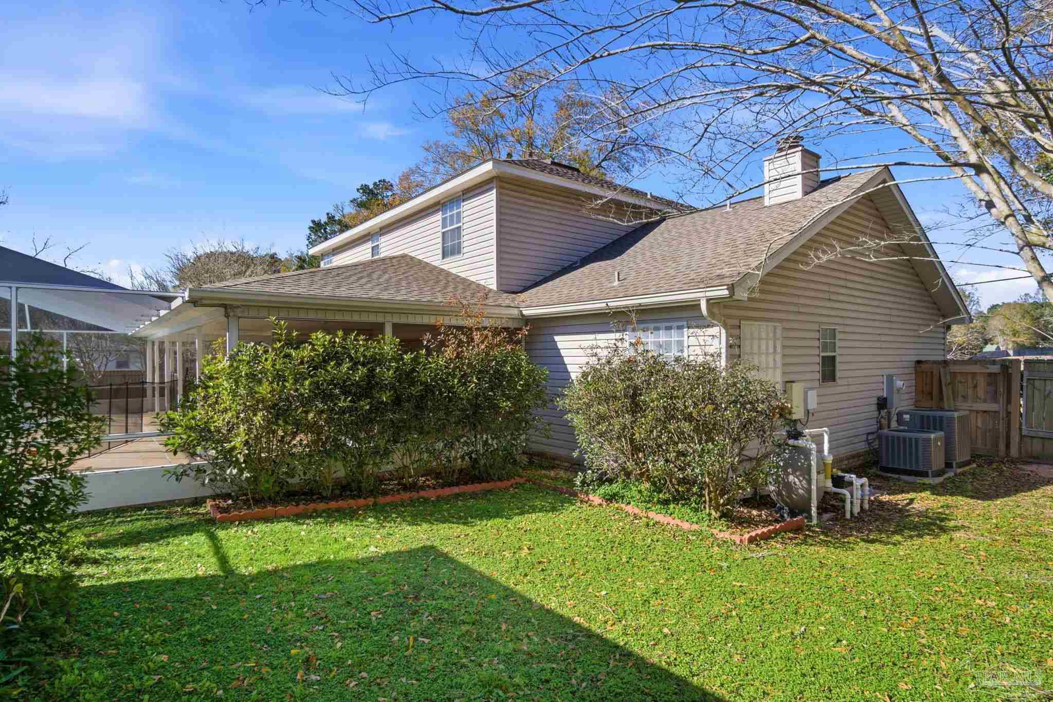 1805 West 10 Mile Road Pensacola, FL 32534 - Photo 43 of 61 a front view of a house with a yard