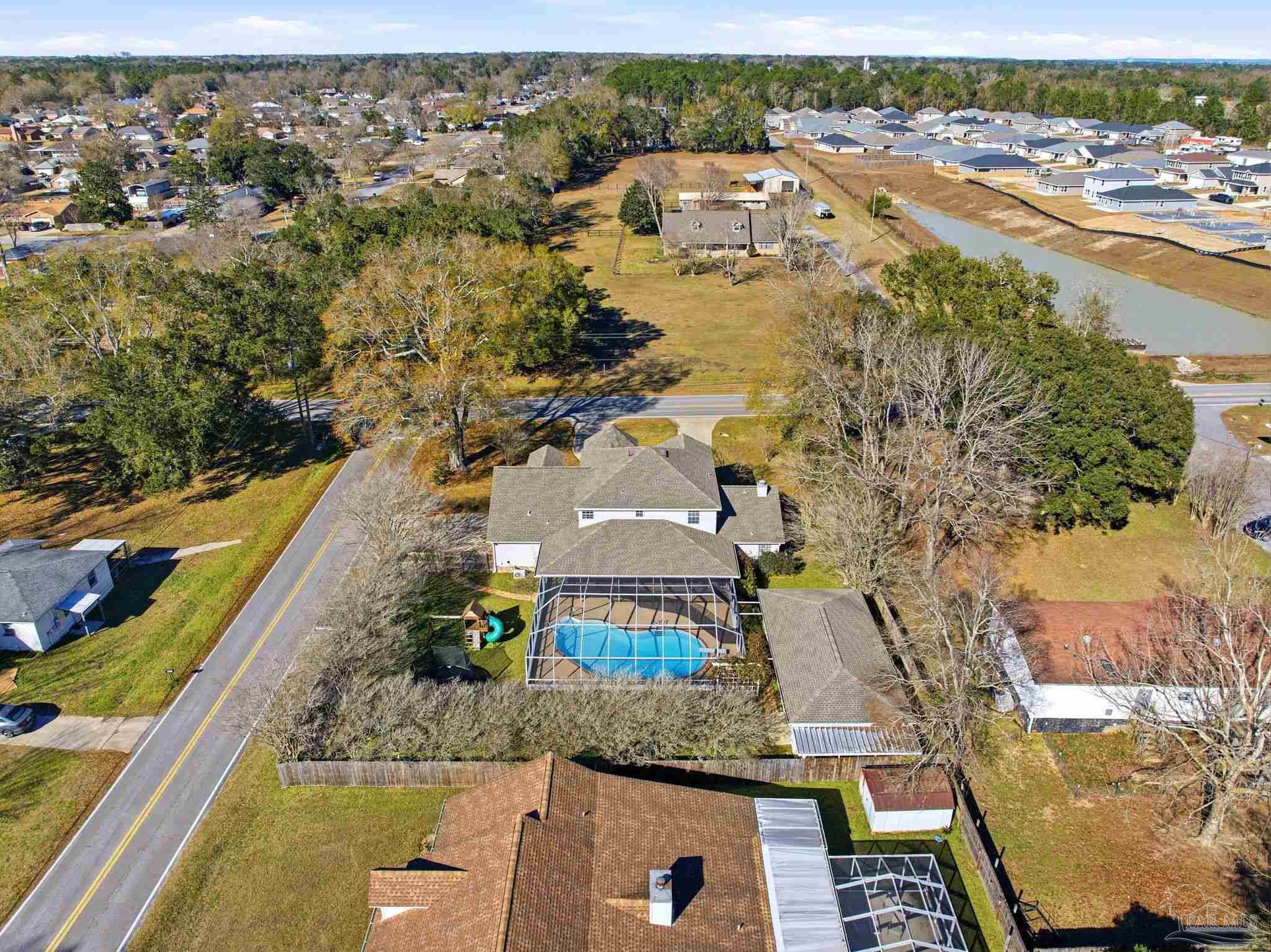 1805 West 10 Mile Road Pensacola, FL 32534 - Photo 54 of 61 an aerial view of residential houses with outdoor space