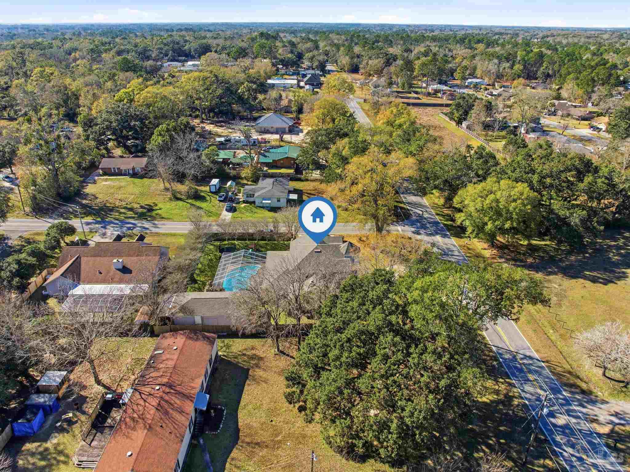 1805 West 10 Mile Road Pensacola, FL 32534 - Photo 55 of 61 an aerial view of a houses with yard