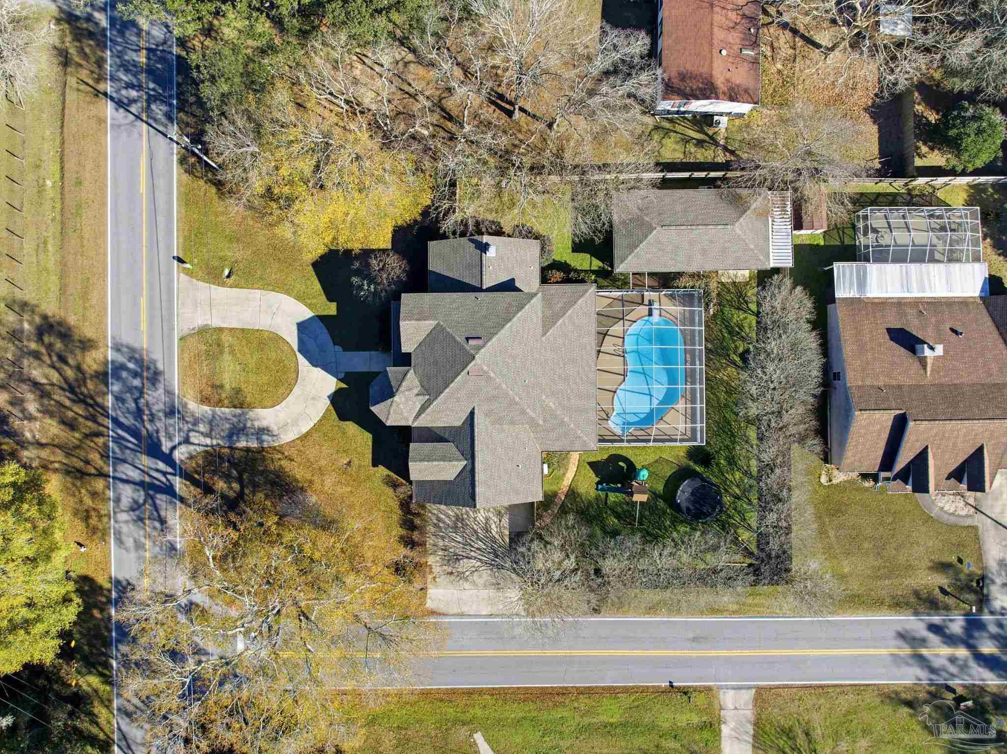 1805 West 10 Mile Road Pensacola, FL 32534 - Photo 60 of 61 an aerial view of a house with large trees